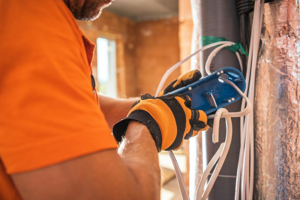 Electrician Preparing Electric Outlet